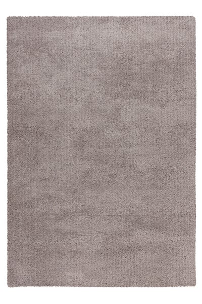 Ein unifarbener Hochflor Teppich mit weicher Struktur für den Wohnbereich.