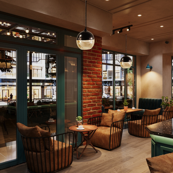 Café-Interieur mit Sesseln, Tischen und Pendelleuchten