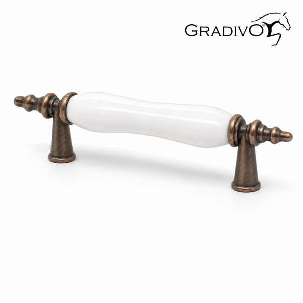 Gradivo Logo. Möbelgriff mit weißem Porzellan und Metallendstücken in antiker Bronzeoptik, Vintage-Stil.