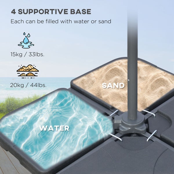 Schwarze Küchenspüle mit Abtropfgestell, Armatur und Tomaten