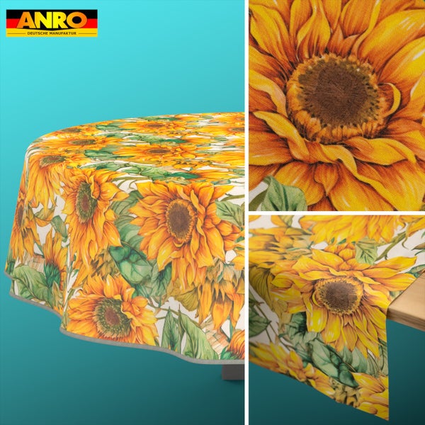 ANRO Logo. Abwischbare Wachstuch Tischdecke mit Sonnenblumenmuster auf einem runden Tisch und Detailansicht der Blüten.