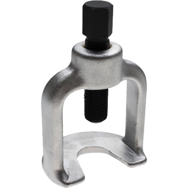Schere schneidet ein kleines Metallobjekt.