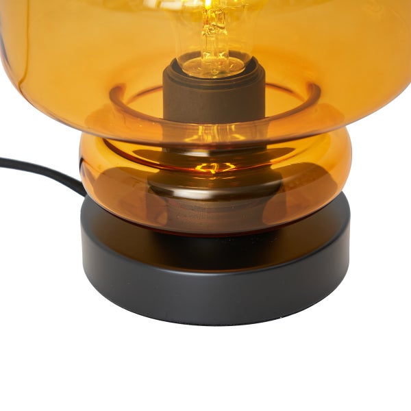 Tischleuchte mit bernsteinfarbenem Glas und schwarzem Sockel