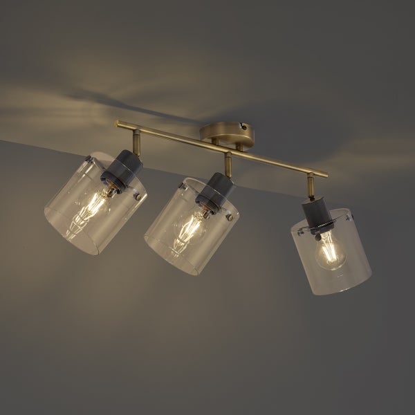 Deckenleuchte mit drei Lampen und klaren Glasschirmen