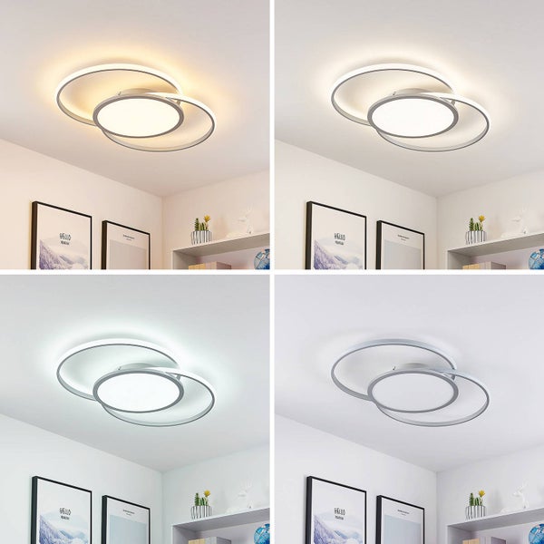 LED-Deckenleuchte mit drei ineinander verschlungenen Ringen, dargestellt in warmweißem, neutralweißem und kaltweißem Licht sowie ausgeschaltet.