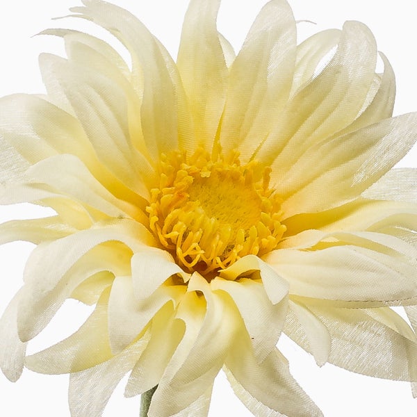 Detailaufnahme einer Kunstpflanze mit grünen Blättern und braunen Stielen.