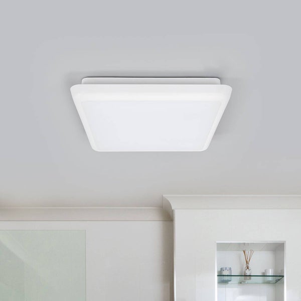 Quadratische weiße LED-Deckenleuchte mit abgerundeten Ecken, an einer Zimmerdecke montiert.
