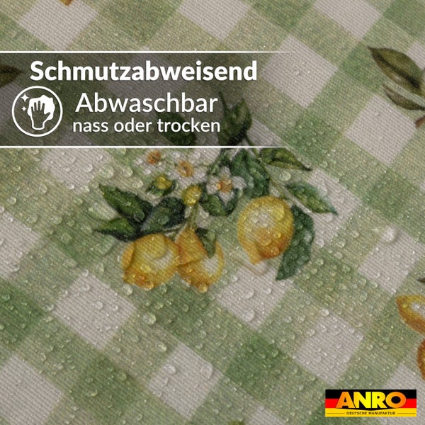 Schmutzabweisende und abwaschbare Tischdecke mit Karomuster und Zitronen, wasserabweisende Oberfläche mit Tropfen. ANRO Logo.