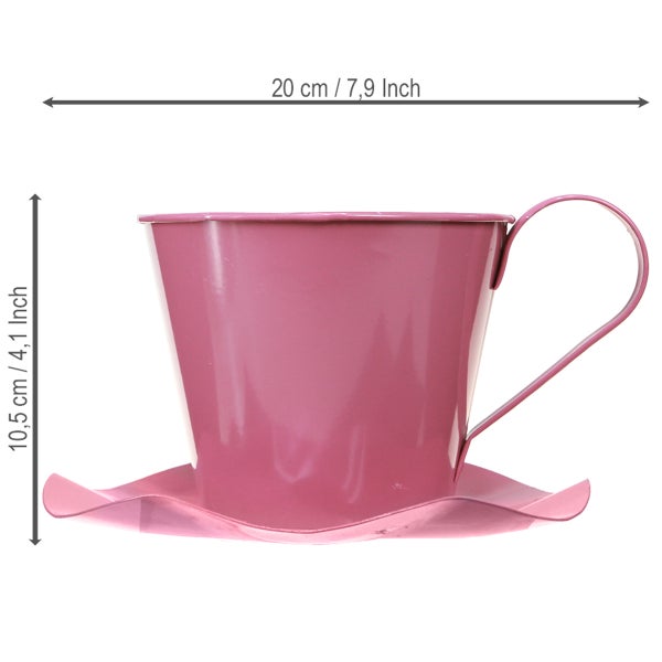Rosa Pflanztopf in Tassenform aus Metall, Höhe 10,5 Zentimeter, Breite 20 Zentimeter.
