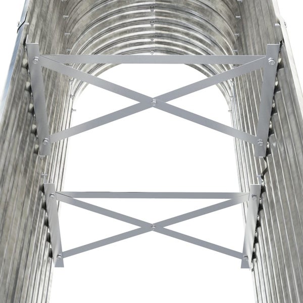 Detailansicht eines Gartenmöbelstücks mit Sitzkissen und geflochtener Oberfläche