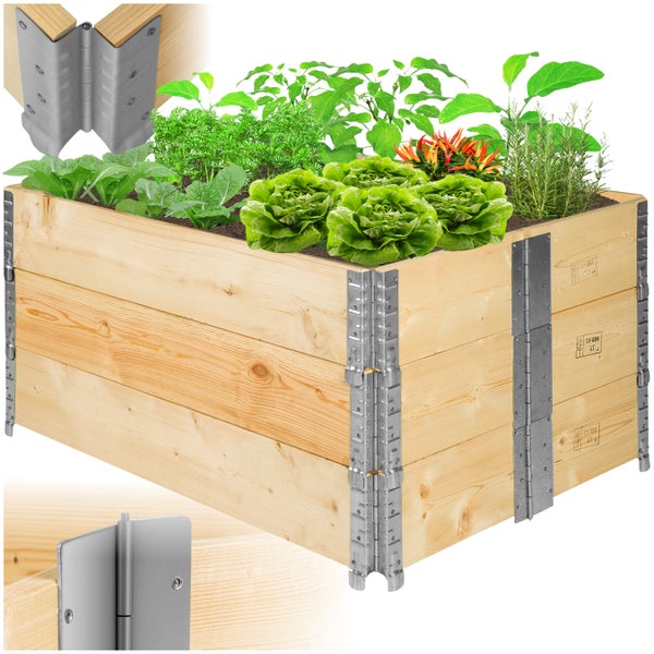 Hochbeet aus Holz mit verschiedenen Pflanzen und Metallbeschlägen