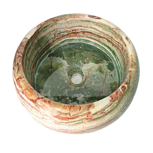Rundes Aufsatzwaschbecken aus Naturstein Onyx mit charakteristischer Maserung.