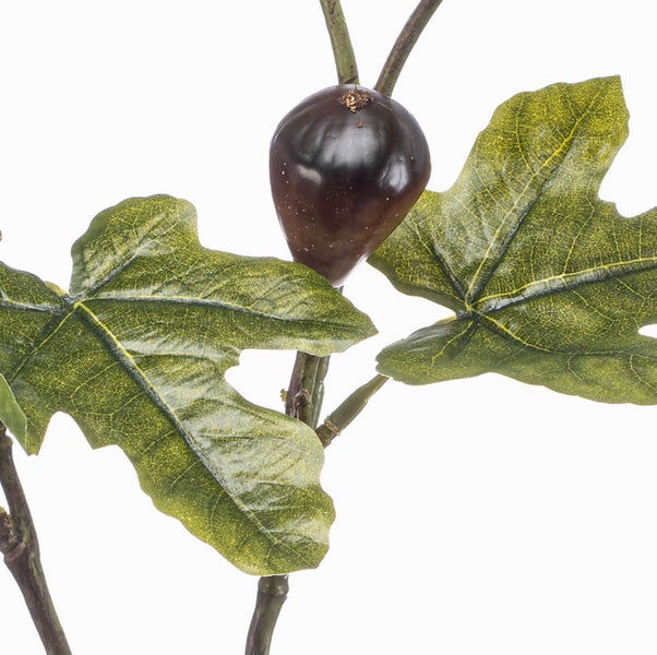 Künstlicher Dekozweig mit einer braunen Feige und einem grünen Blatt.