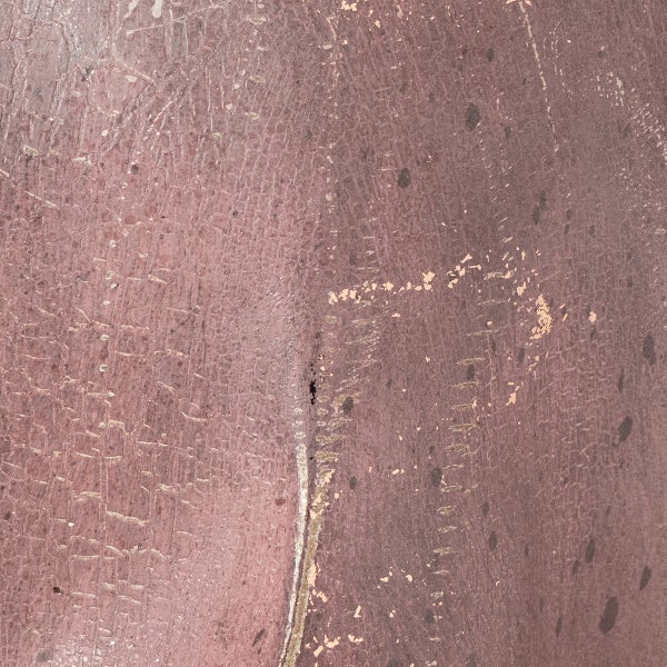 Nahaufnahme einer strukturierten Oberfläche mit Farbabplatzungen