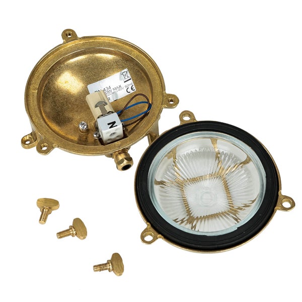 Geöffnete runde Messingleuchte mit Schrauben