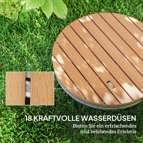 Runde Bodendusche in Holzoptik mit achtzehn Wasserdüsen auf einer Rasenfläche.