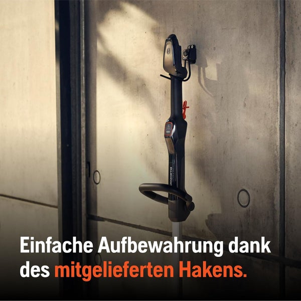 Akkubetriebener Rasentrimmer zur Aufbewahrung an der Wand mit dem mitgelieferten Haken.