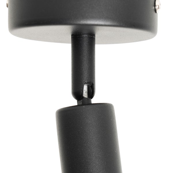 Detailaufnahme einer schwarzen Deckenleuchte mit Spot