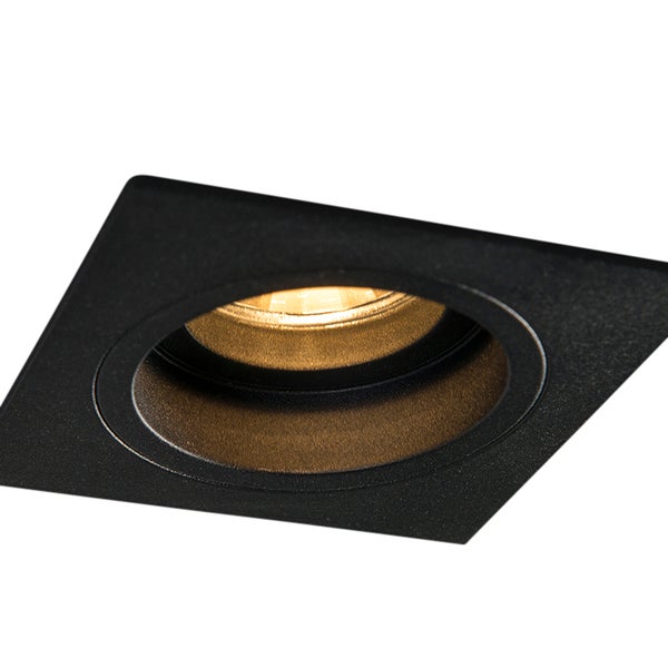 Quadratischer Einbaustrahler in Schwarz mit runder Lichtöffnung und warmem Licht.