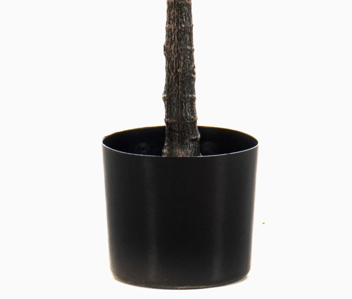 Künstliche Lilie mit drei weiß-rosa Blüten und zwei grünen Knospen am Stiel.