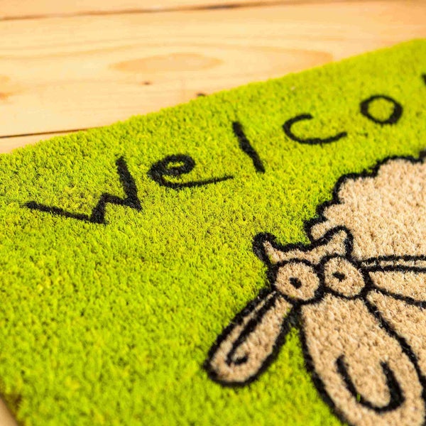 Fußmatte mit Willkommensgruß und Schafmotiv