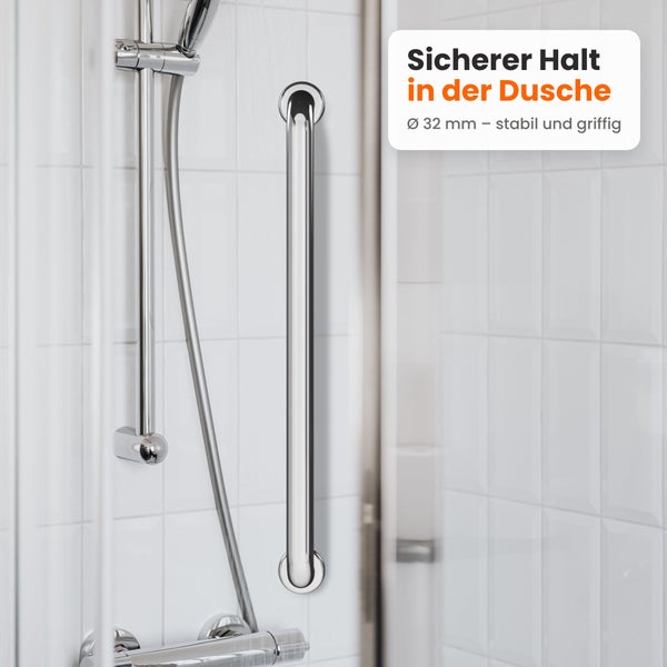 Wandhaltegriff mit 32 Millimeter Durchmesser für mehr Sicherheit in der Dusche, montiert an einer hell gefliesten Duschwand.