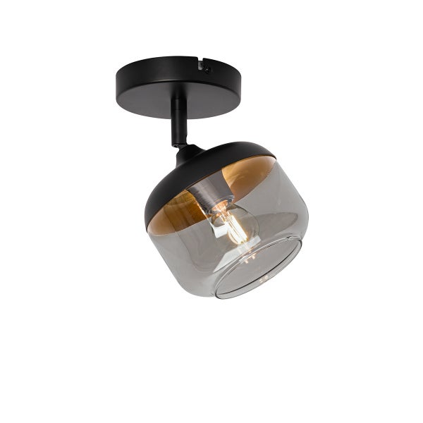 Deckenstrahler mit verstellbarem Schirm aus Rauchglas, schwarzem Metallsockel und sichtbarem Filament-Leuchtmittel.