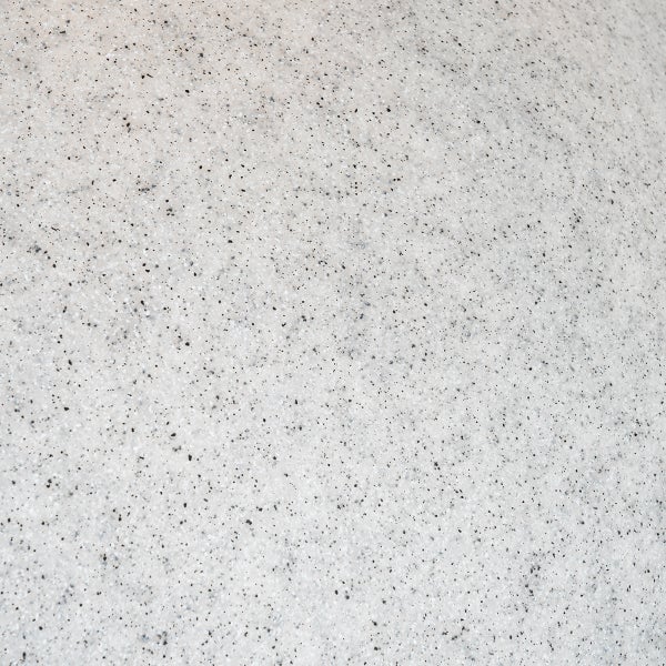 Nahaufnahme einer strukturierten Oberfläche in Granitoptik