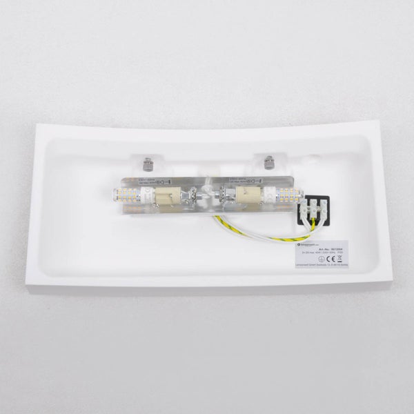 Innenansicht einer Wandleuchte mit zwei G9 LED Leuchtmitteln, Anschlussklemmen, Verkabelung und technischem Typenschild.