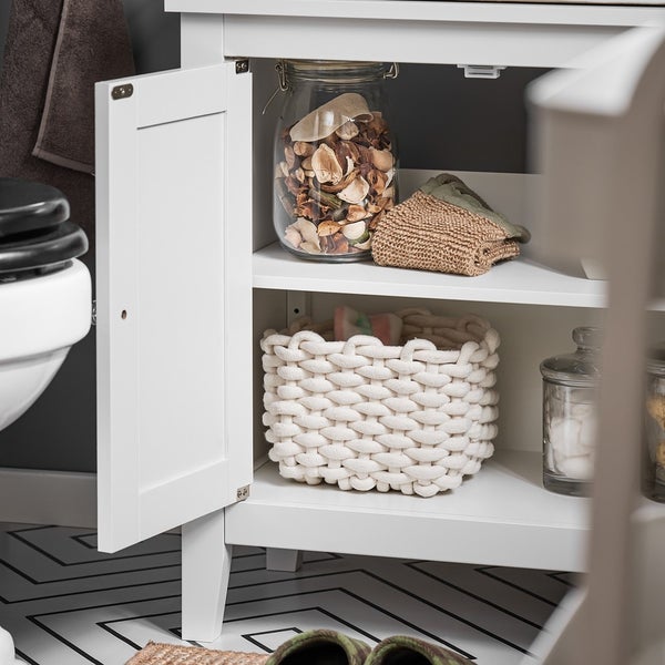 Badezimmerunterschrank mit offenem Fach und diversen Aufbewahrungsbehältern