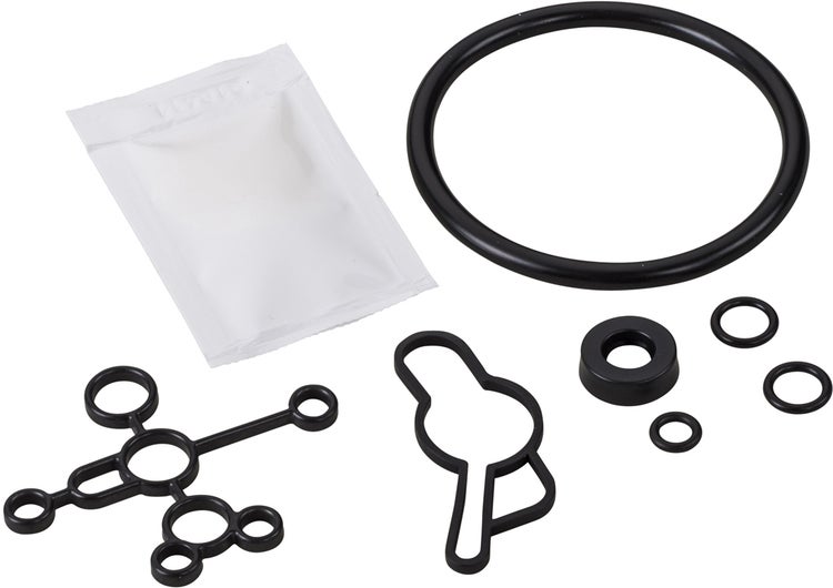 Dichtungsset für Armaturen aus Gummi mit verschiedenen O-Ringen, Profildichtungen und einer Packung Schmiermittel.
