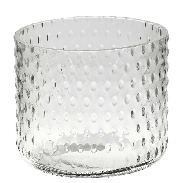 Zylindrischer Übertopf aus Glas mit Noppenstruktur.