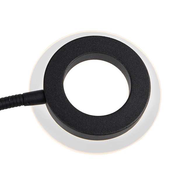 Detailansicht einer Tischleuchte mit flexiblem Arm und ringförmigem Lampenkopf