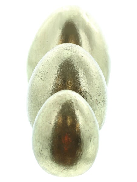 Dekorative goldfarbene Steine gestapelt