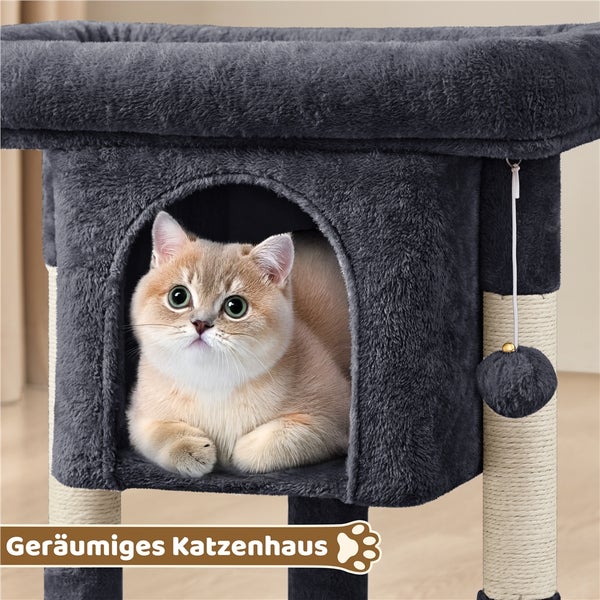 Katze in einem grauen Katzenhaus mit Kratzbaum