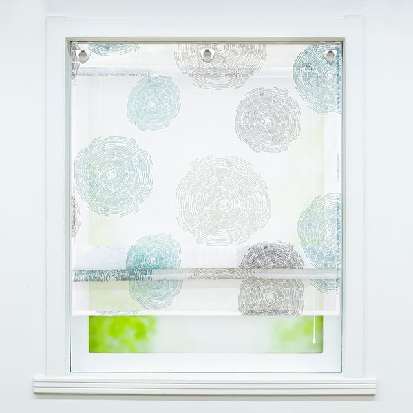 Raffrollo mit Kreismuster im Fenster