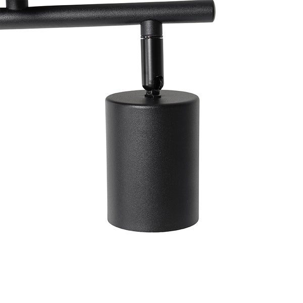 Detailaufnahme einer schwarzen Deckenleuchte mit Spot