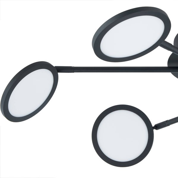 Nahaufnahme einer LED-Leuchte mit runden, schwarzen Lichtköpfen und weißen Kunststoffabdeckungen.