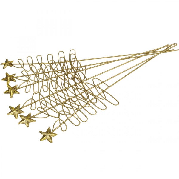 Mehrere goldfarbene Baumspitzen mit Stern