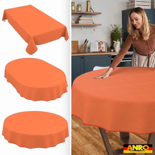 Orangefarbene Tischdecken in rechteckiger, ovaler und runder Form. Frau glättet Tischdecke auf einem Küchentisch. ANRO Logo.