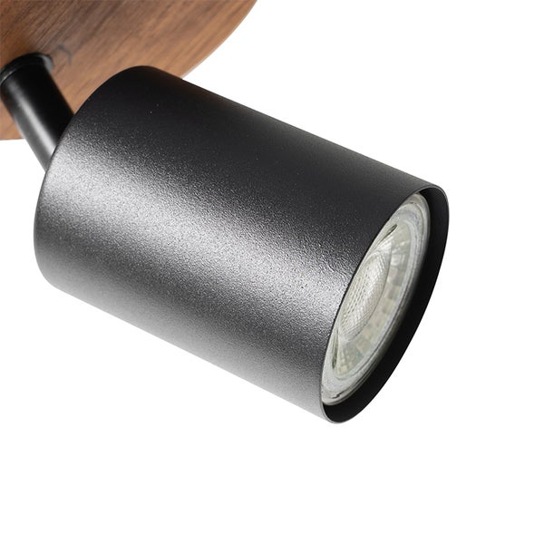 Schwarzer Deckenspot mit Holzsockel