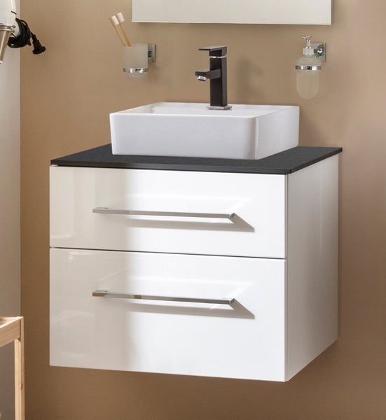 Waschtischunterschrank mit zwei Schubladen, Aufsatzwaschbecken und Armatur im Badezimmer.