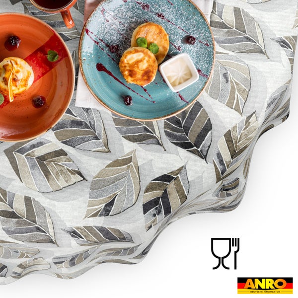 Abwaschbare Tischdecke mit Blättermuster. Lebensmittelecht. ANRO Deutsche Manufaktur Logo.