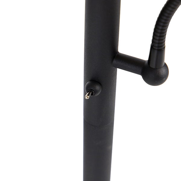 Detailansicht eines schwarzen Metall-Lampengestells mit Kippschalter und flexiblem Arm.