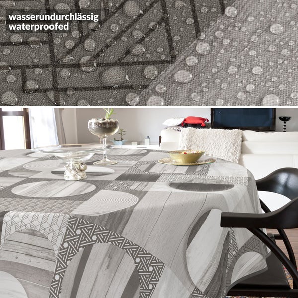 Wasserundurchlässige Tischdecke mit geometrischem Muster auf einem Tisch