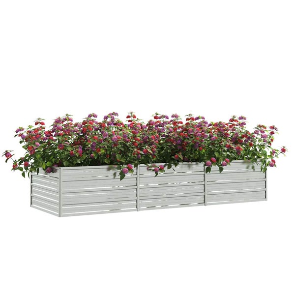 Rechteckiges Hochbeet aus Holzlatten, bepflanzt mit blühenden Blumen.