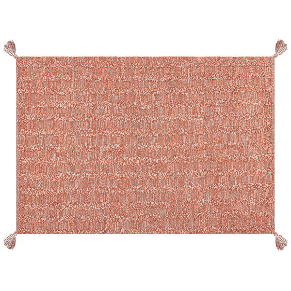 Rechteckiger Teppich in Terracotta mit Fransen an den Ecken und gewebter Struktur.