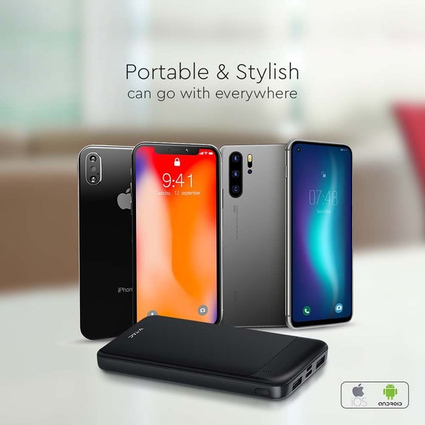 Schwarze Powerbank vor Smartphones