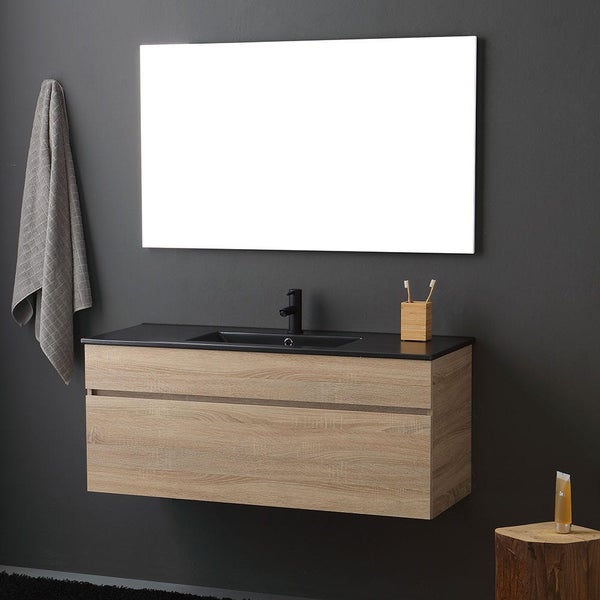 Moderner Waschplatz mit wandhängendem Waschtisch in Holzoptik, dunklem Waschbecken und Spiegel in einem Badezimmer.