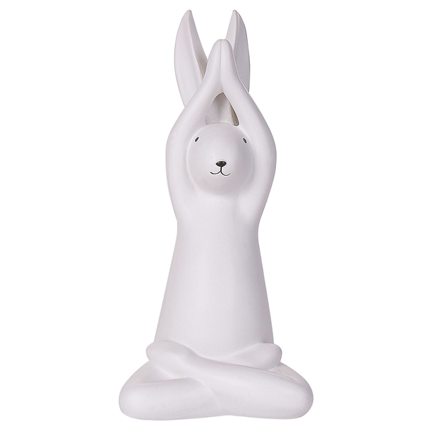 Dekorative Hasenfigur in meditierender Yoga Haltung für die Osterdekoration oder Innenraumgestaltung.